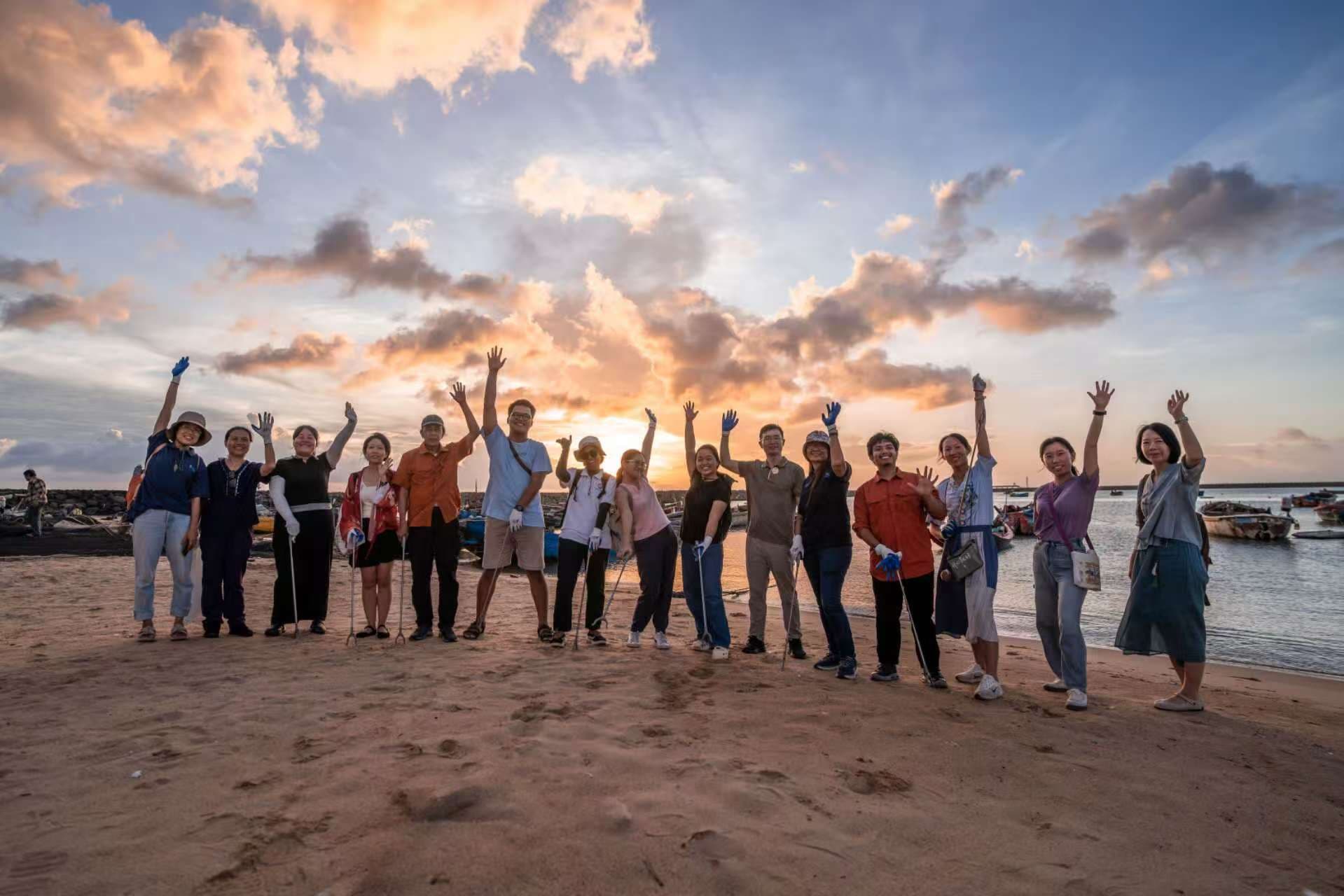 Blue Climate Partnership Young Talent Training Program participants during beach cleanup activity in Beigang Island, Hainan